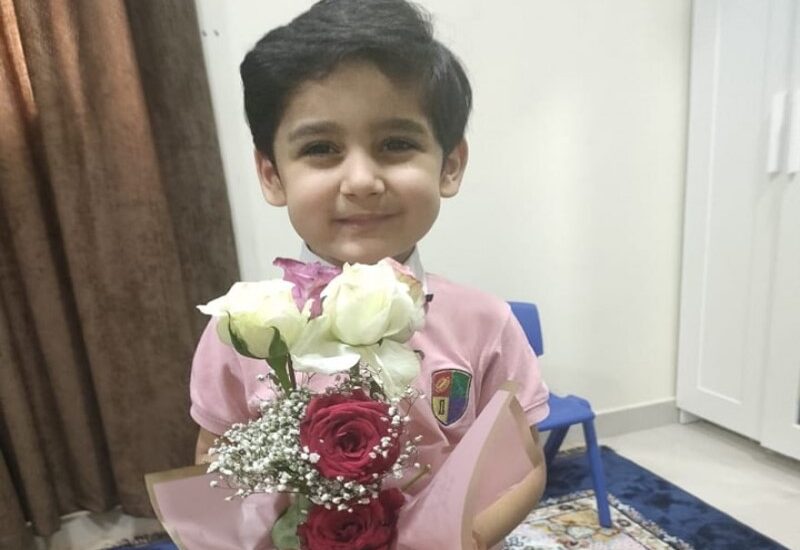 Cute Boy with Flower Bookay